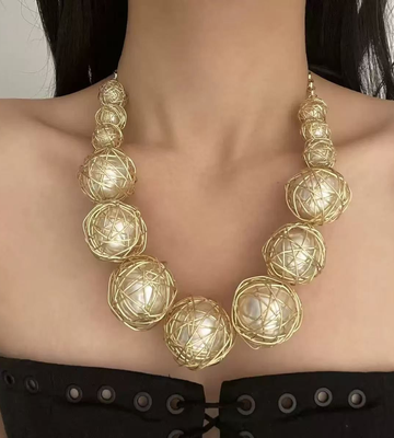Celestial Orbit – A Golden Wrapped Orb Statement Necklace