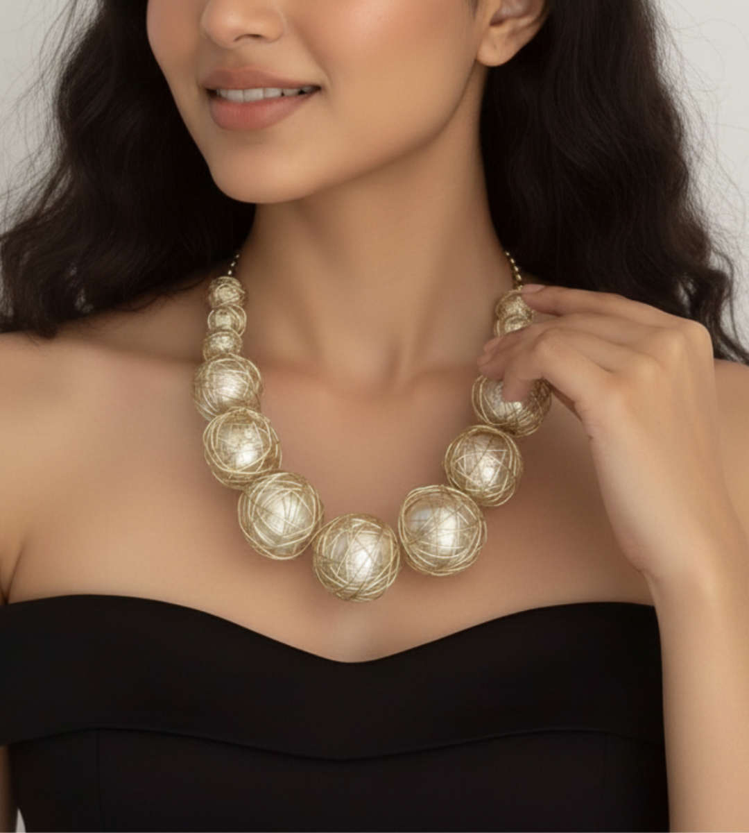Celestial Orbit – A Golden Wrapped Orb Statement Necklace