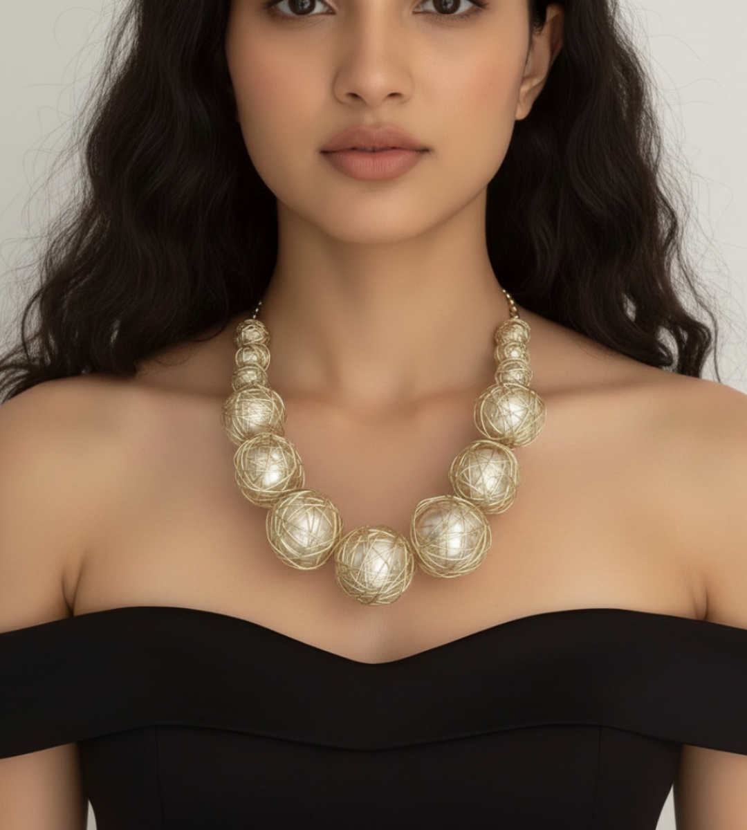 Celestial Orbit – A Golden Wrapped Orb Statement Necklace