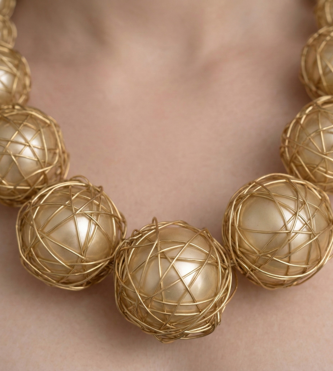 Celestial Orbit – A Golden Wrapped Orb Statement Necklace