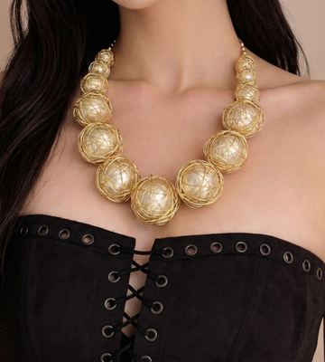Celestial Orbit – A Golden Wrapped Orb Statement Necklace