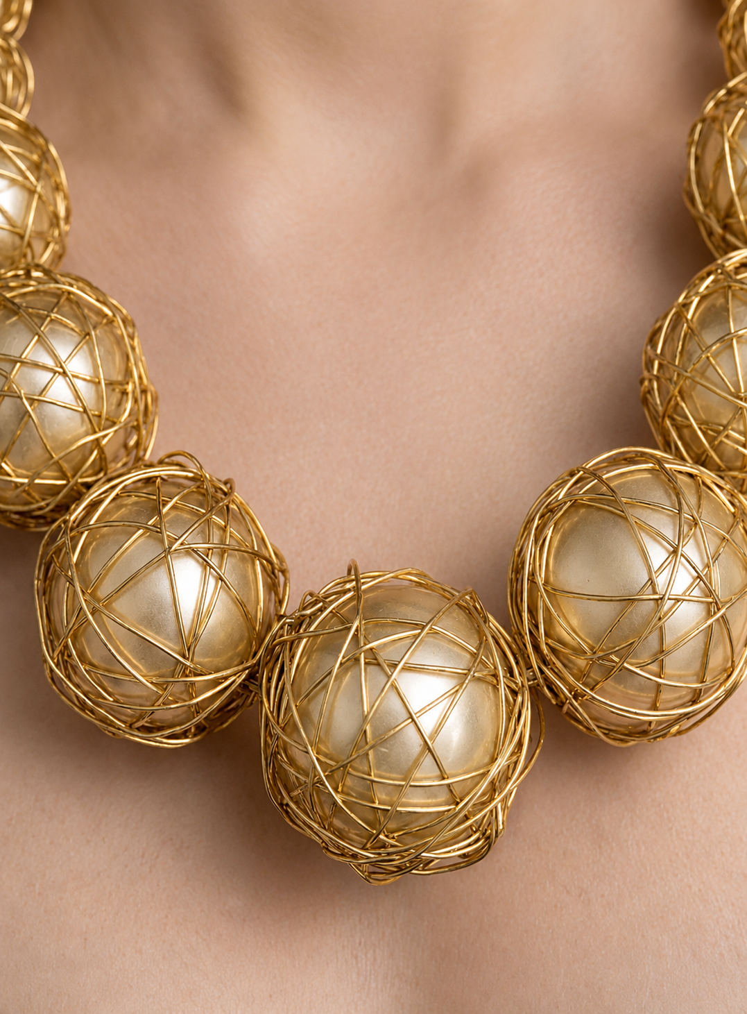 Celestial Orbit – A Golden Wrapped Orb Statement Necklace